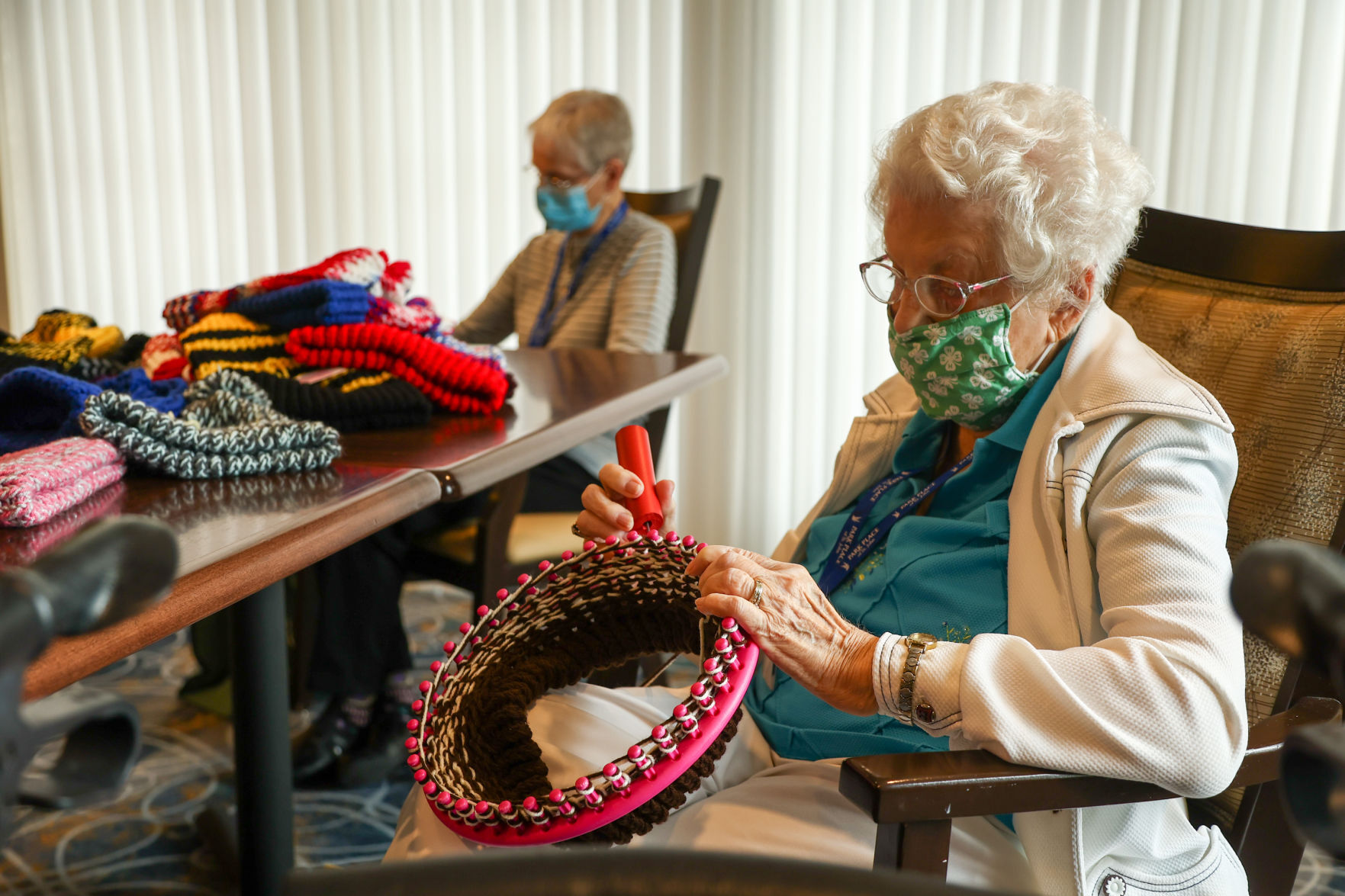 Seniors use looms to create items for charities